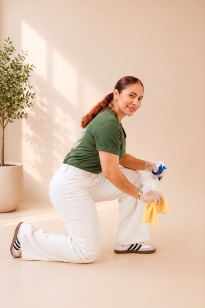Explosion Home Refresh service in San Diego — professional cleaner refreshing kitchen and living area